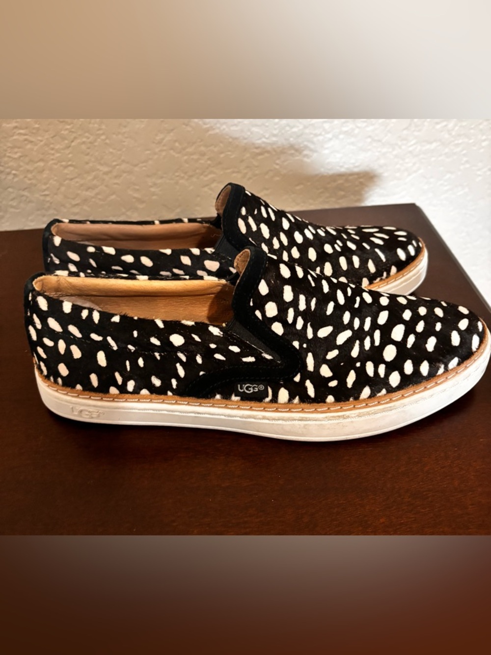 UGG Black and White Spotted Slip-On Sneakers